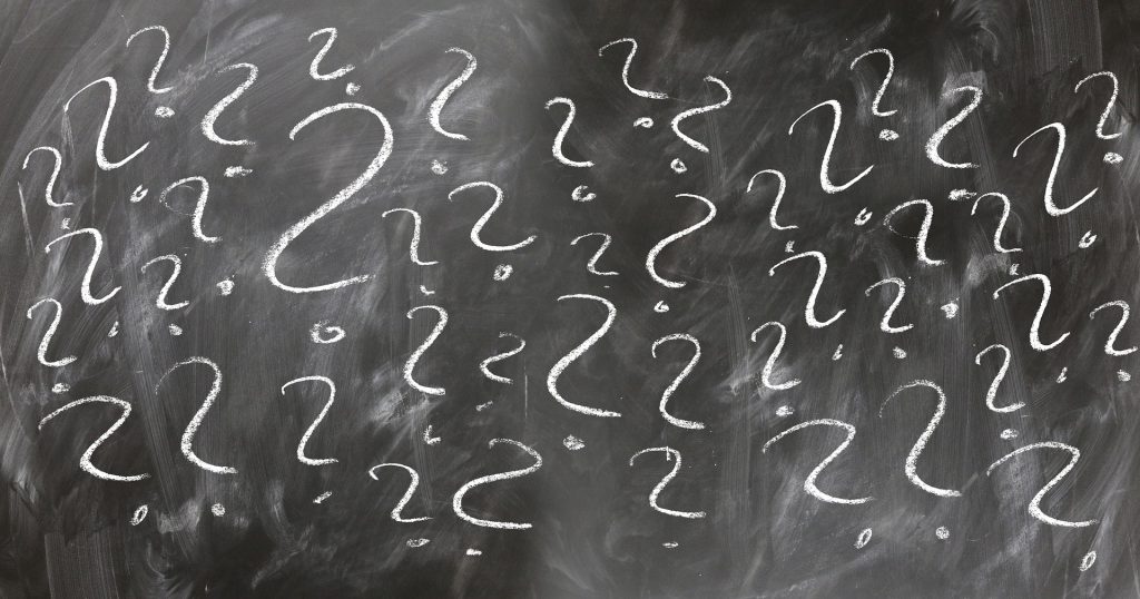 question marks on chalk board