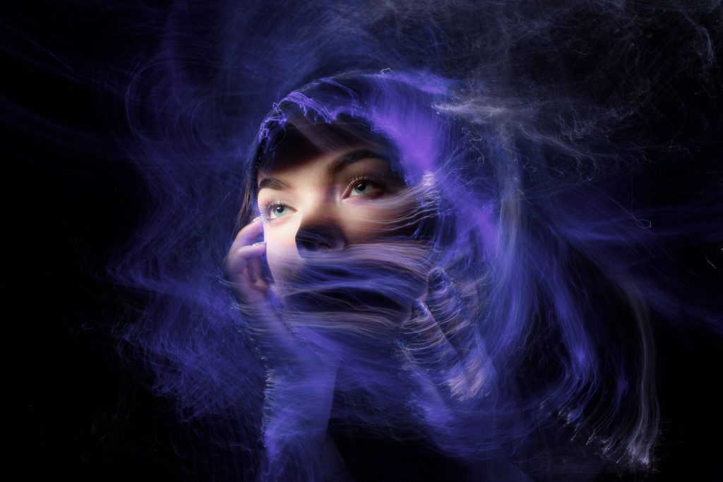girl with weird space dust around face